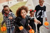 carefree-children-on-halloween-2023-11-27-05-01-47-utc-min